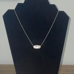 Kendra Scott necklace.